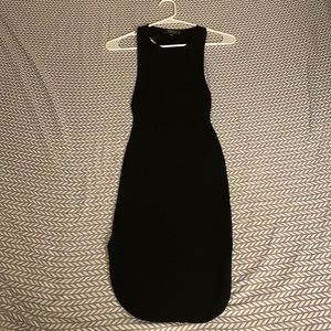 Sleeveless ribbed black dress.